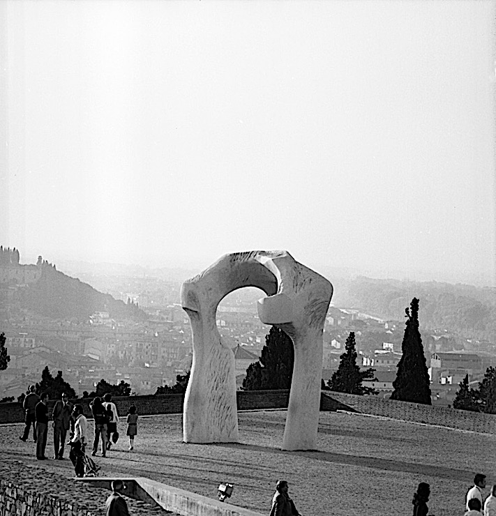 Black-and-white photograph of a Henry Moore sculpture, "The Arch," in the Forte di Belvedere, Florence