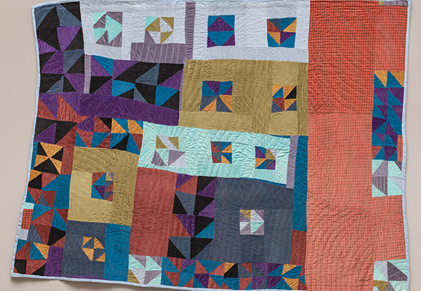 Pieced by Rosie Lee Tompkins; qulted by Irene Bankhead; Untitled (framed half-squares four patch)