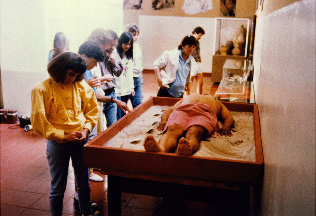 James Lunav performing "The Artifact Piece" in 1987 at the San Diego Museum of Man.