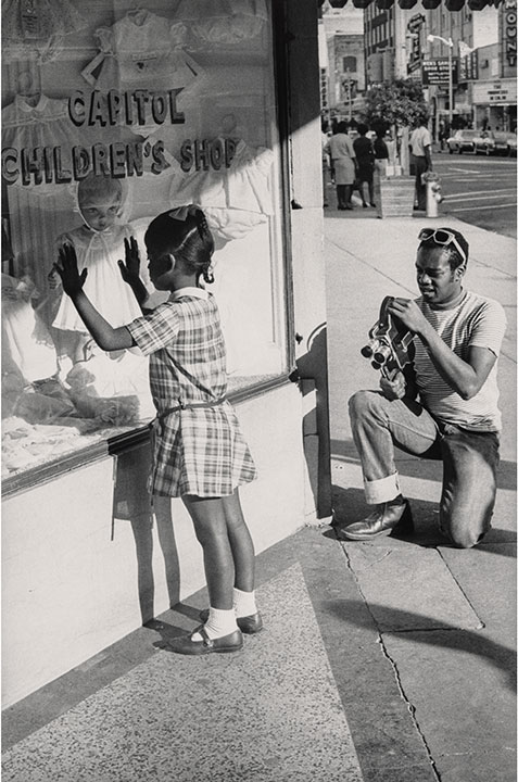 Doris Derby, "Member of Southern Media Photographing a Young Girl, Farish Street, Jackson, Mississippi"