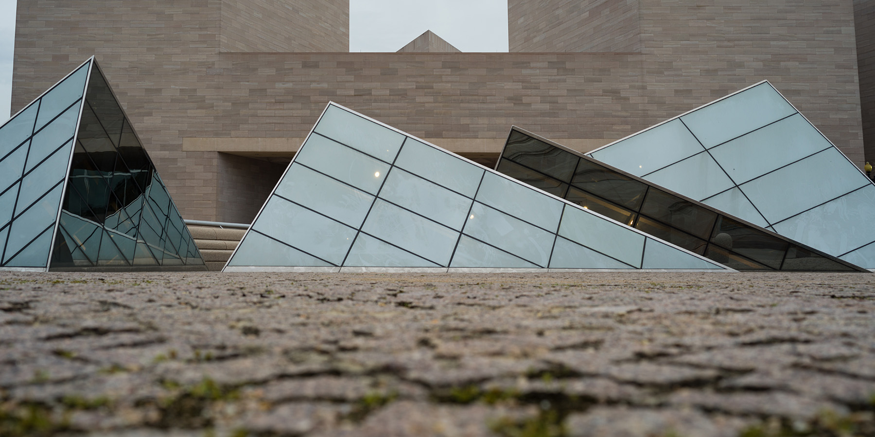 Ground view of the National Gallery's glass pyramids looking towards the East Building
