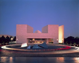 Designed by I. M. Pei, the East Building of the National Gallery of Art has a dramatic glow after dark due to its Tennessee pink marble, taken from the same quarries that provided stone for the West Building. Photo © Dennis Brack/Black Star. National Gallery of Art, Washington, Gallery Archives