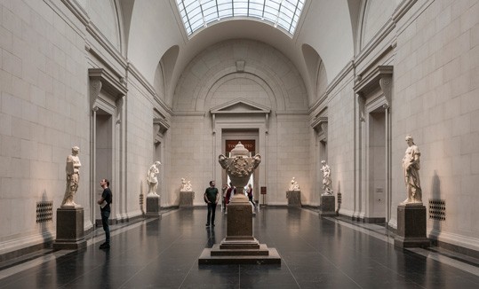 The East Sculpture Hall of the West Building at the National Gallery of Art, Washington—a stately passageway between the Rotunda and the East Garden Court—lined with marble works by some of the greatest French sculptors of the 17th to 19th centuries.