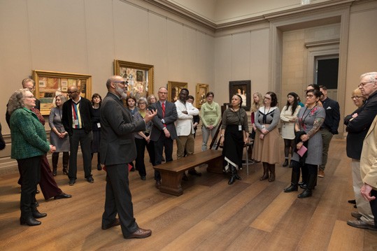 Richard J. Powell, Edmond J. Safra Visiting Professor, leads a tour in the American galleries to CASVA members.