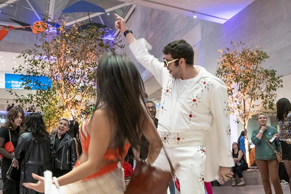 Visitors dancing during a National Gallery's Nights event at the National Gallery of Art.