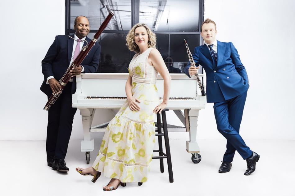 A band posing with their instruments.