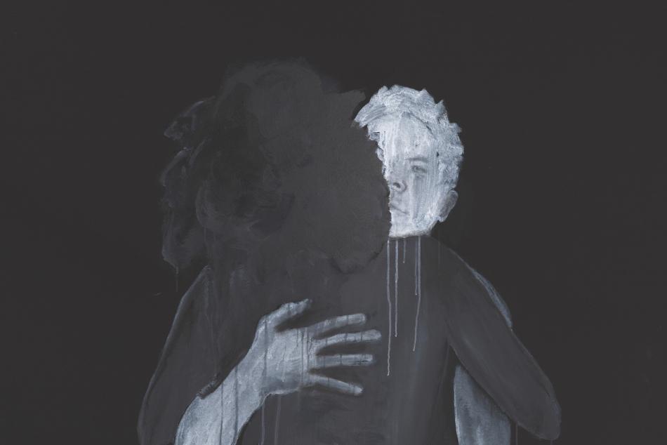 Two people hugging.