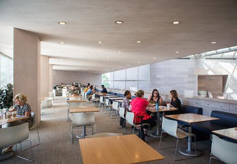 Visitors sitting at tables enjoying food and drinks in the National Gallery's Terrace Café.