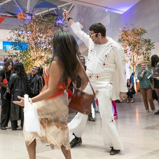 Visitors dancing during a National Gallery's Nights event at the National Gallery of Art.