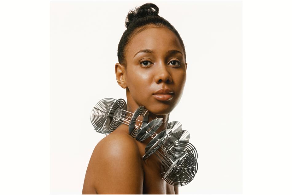 Kwame Brathwaite's photograph of a young woman, Untitled (Portrait, Reels as Necklace), c. 1972