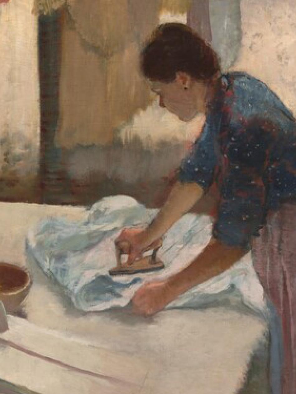 A person ironing with windows in the background