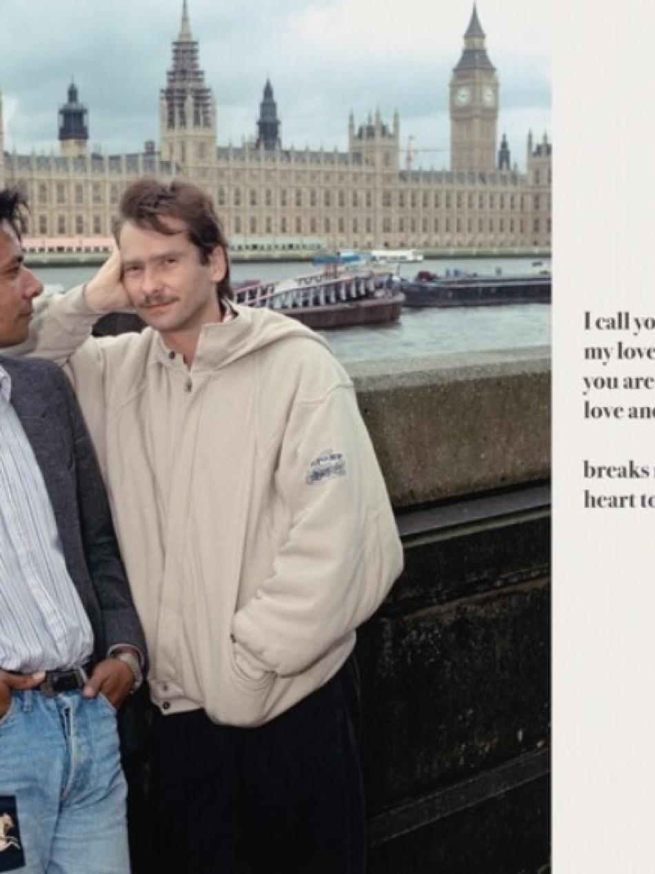 Two men stand side by side by a river. Text along a panel reads "I call you my love though you are not my love and it breaks my hear to tell you"