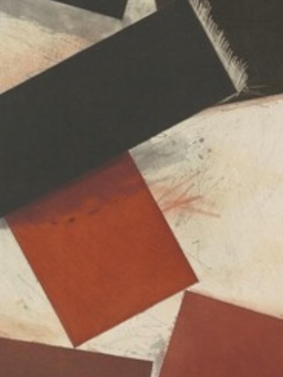 There are multiple rectangles, some black and some brown. They are stacked on top of each other but at angles that make them appear as blocks that have been knocked over.