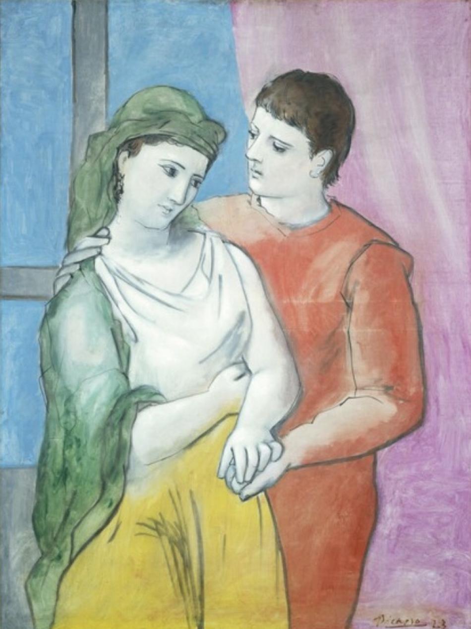 A man and woman with pail skin hold each other.