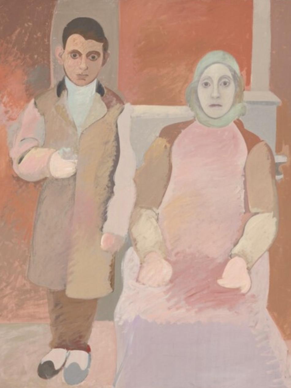 A woman is seated and a younger man stands to her right side.