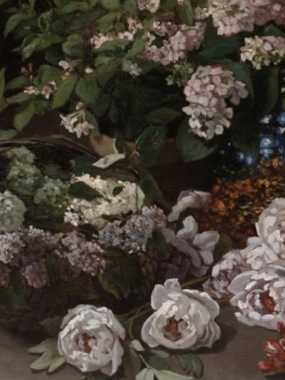 Several bouquets of flowers lie on a table.