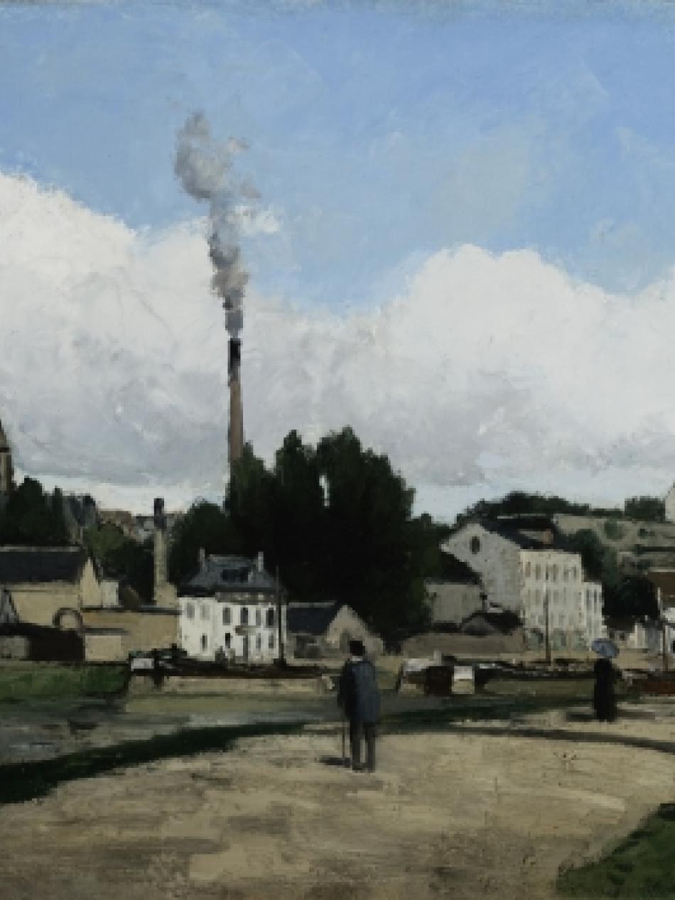 A man with a tophat stands on the bank of a river. We see him from behind as he looks at the town across the river.