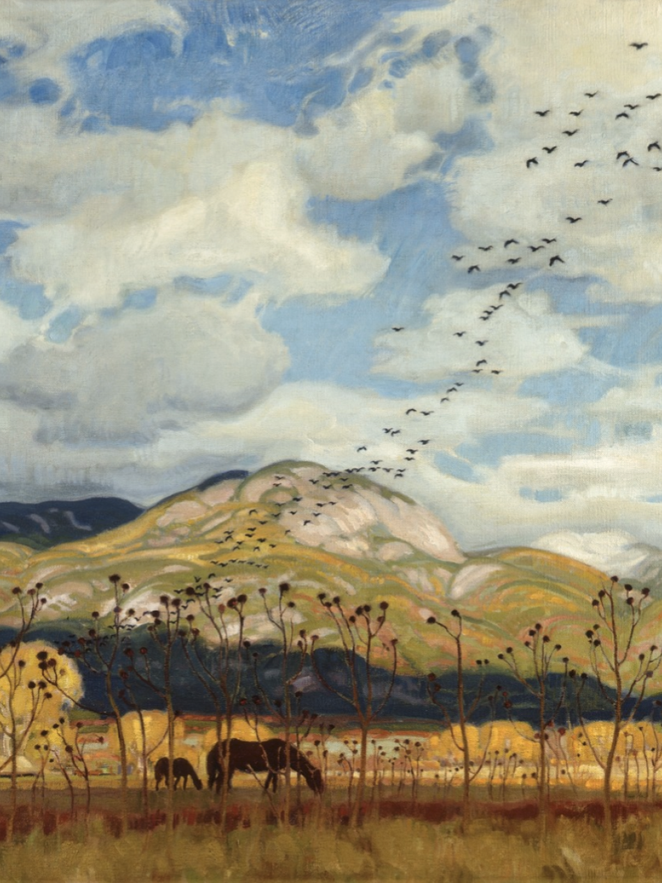 A landscape painting of rolling hills and a cloudy sky with a V-shaped flock of birds flying across; bare, tall plants are in the foreground, and two horses graze in the field.