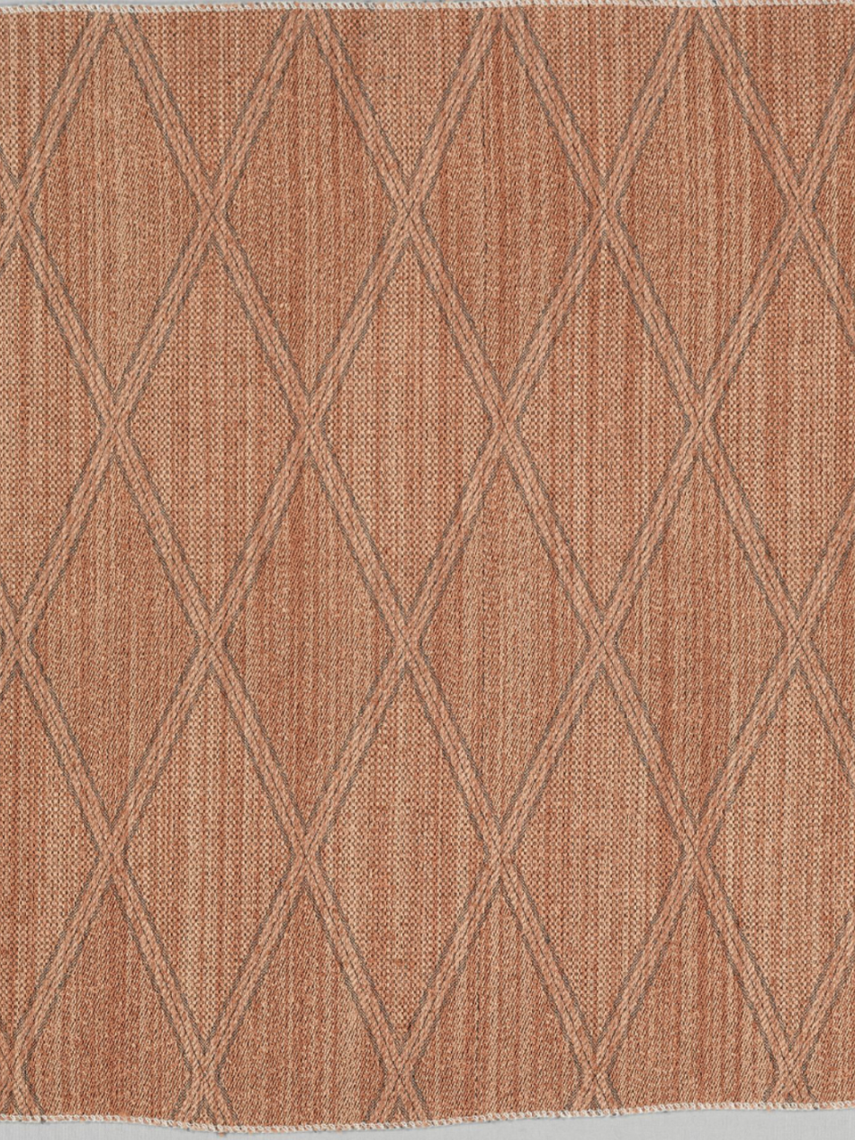 This is a photo of brown fabric with a subtle diagonal pattern.