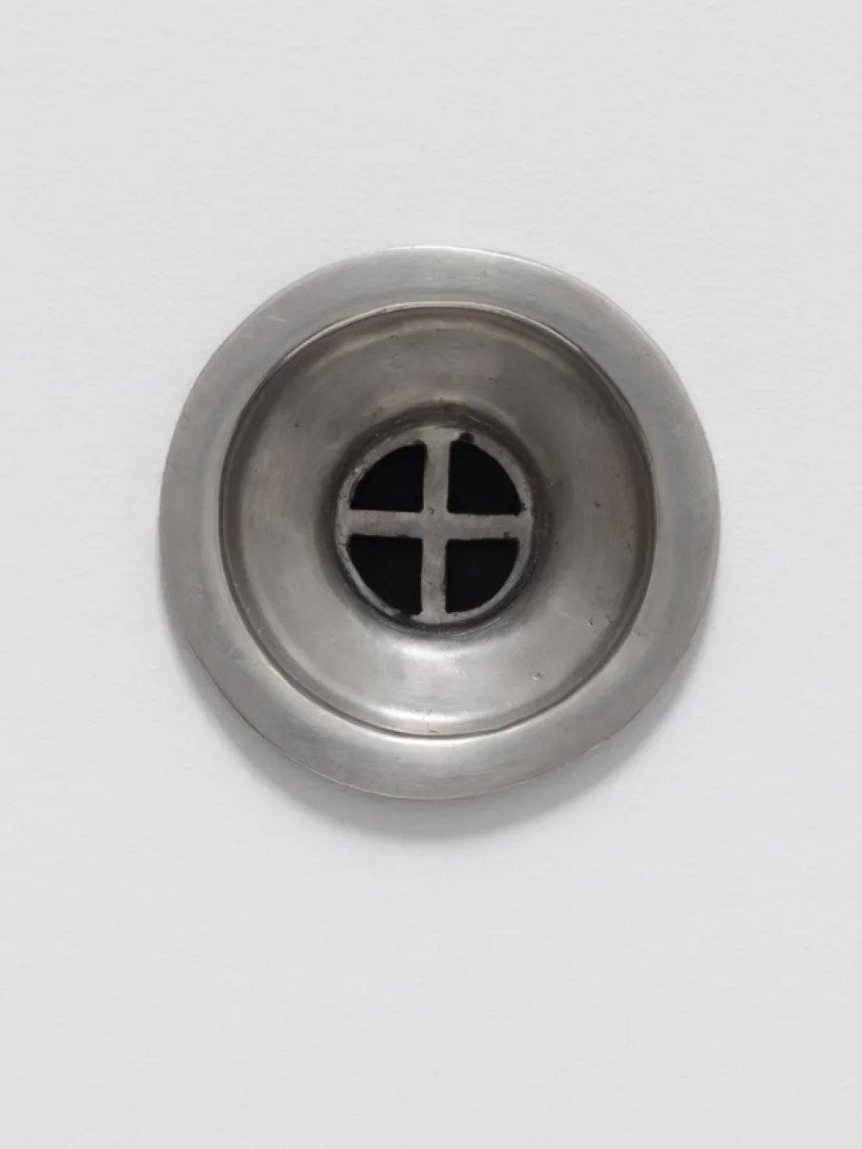 This is a photo of an empty drain as seen from above.